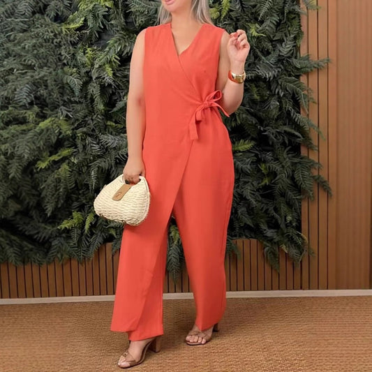 🔥🎁Nyhet 50 % RABATT🌸Enfärgad, ledig jumpsuit med V-ringning och knytdetalj för dam
