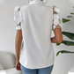 Damskjorta med enfärgad fluga och kortärmad design
