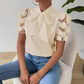 Damskjorta med enfärgad fluga och kortärmad design